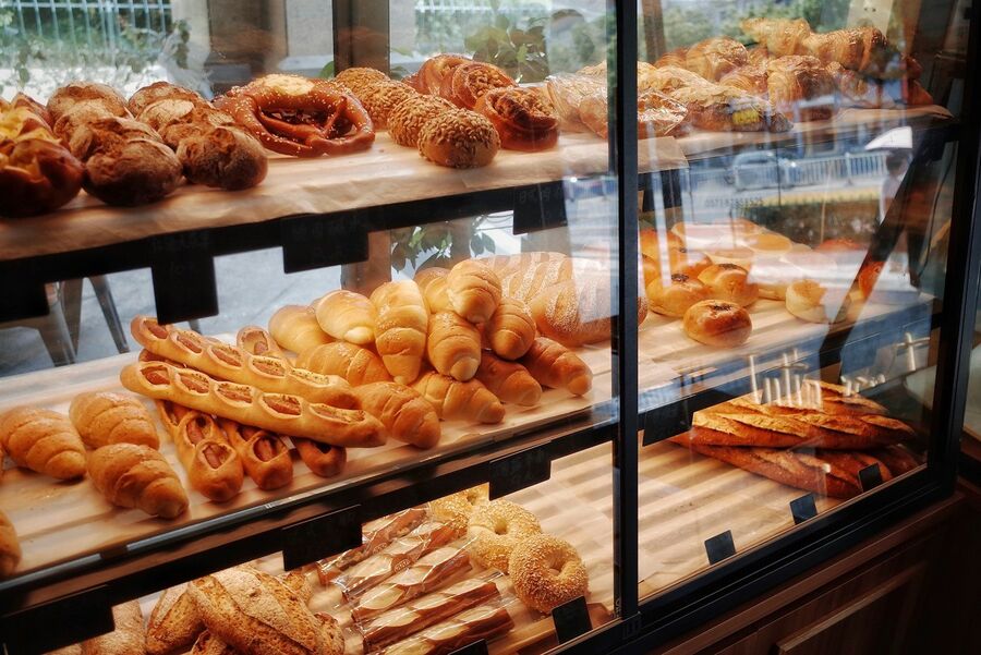 Bakery display counter with breads and pastries